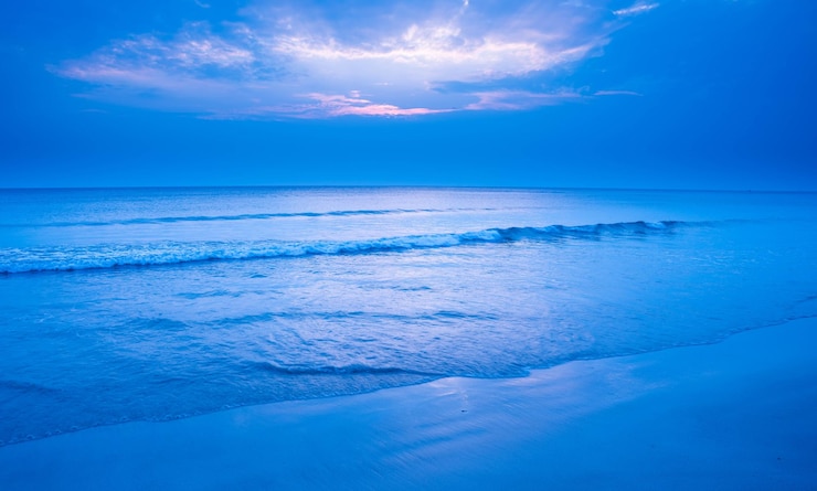 Photo scenic view of sea against blue sky