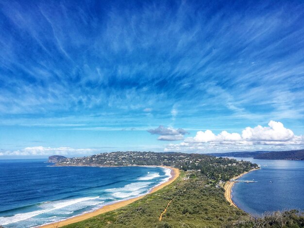 Scenic view of sea against blue sky