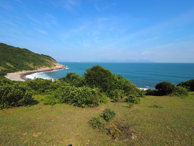 Scenic view of sea against blue sky