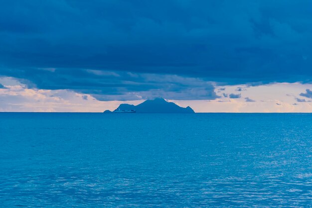 Scenic view of sea against blue sky