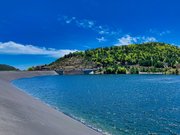 Scenic view of sea against blue sky