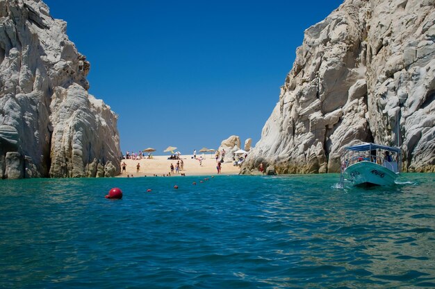 Scenic view of sea against clear blue sky