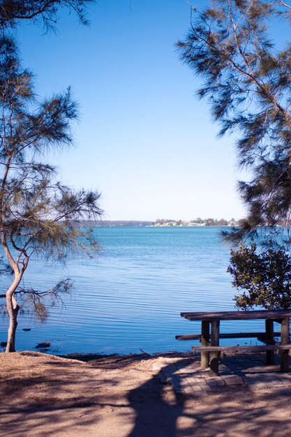 Photo scenic view of sea against clear blue sky