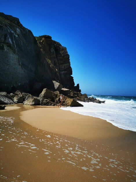 Photo scenic view of sea against clear blue sky