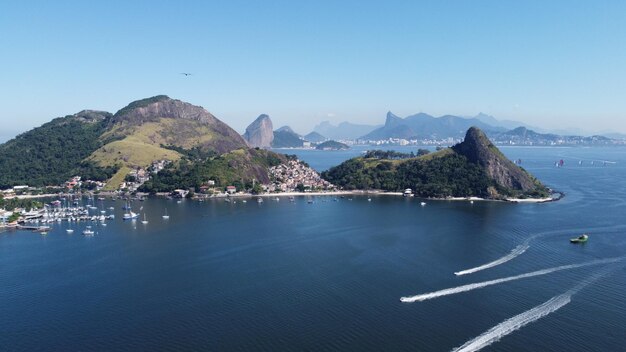 Photo scenic view of sea against clear blue sky