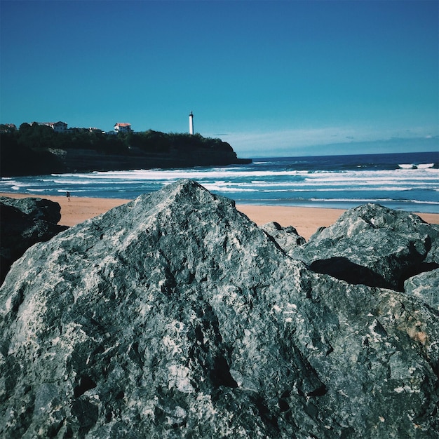 Photo scenic view of sea against clear blue sky