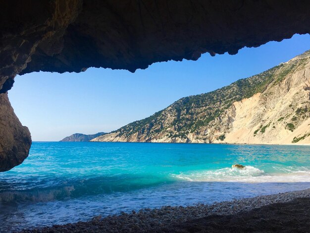 Photo scenic view of sea against clear blue sky