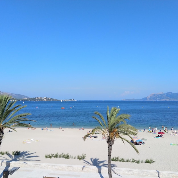 Scenic view of sea against clear blue sky