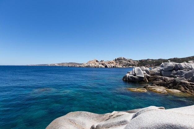 Scenic view of sea against clear blue sky