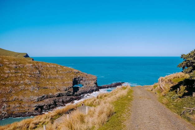 Photo scenic view of sea against clear blue sky