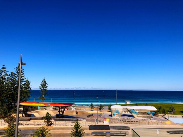 Scenic view of sea against clear blue sky