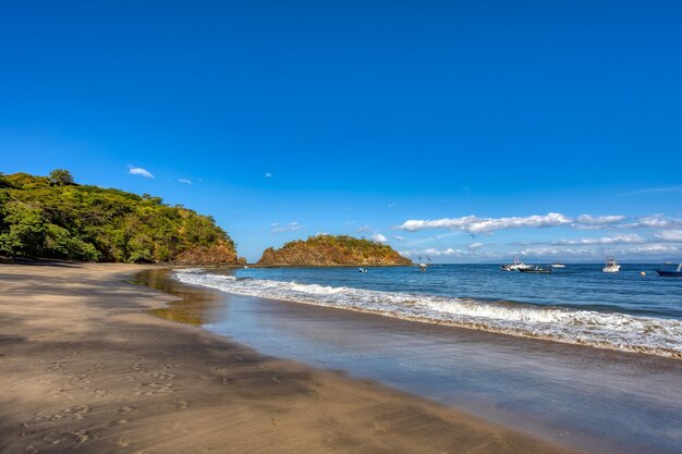 Photo scenic view of sea against clear blue sky