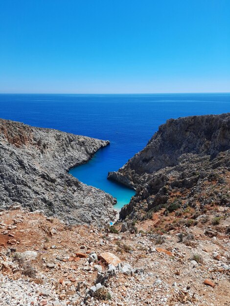 Scenic view of sea against clear blue sky