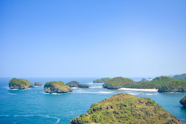 Scenic view of sea against clear blue sky