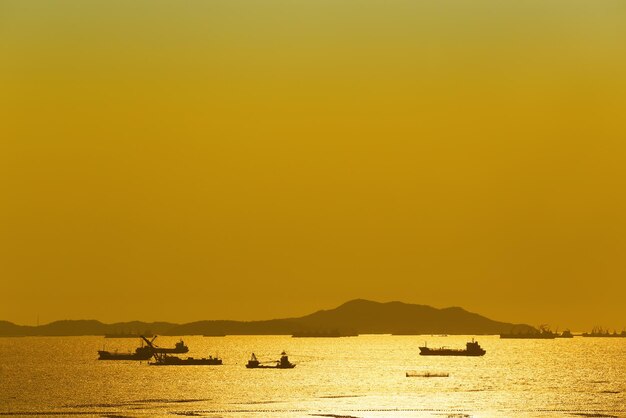 Scenic view of sea against clear sky during sunset