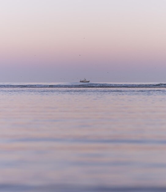 Photo scenic view of sea against clear sky