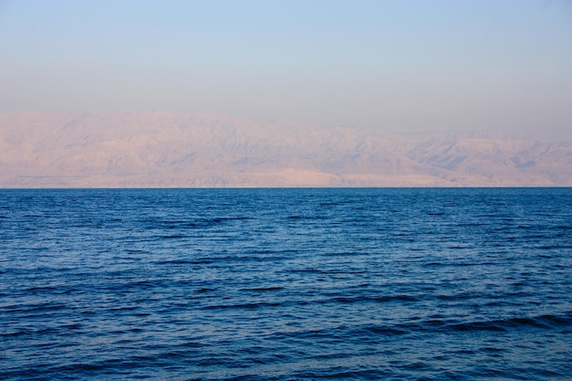 Photo scenic view of sea against clear sky