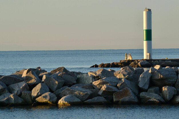 Photo scenic view of sea against clear sky