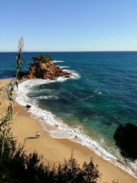 Photo scenic view of sea against clear sky