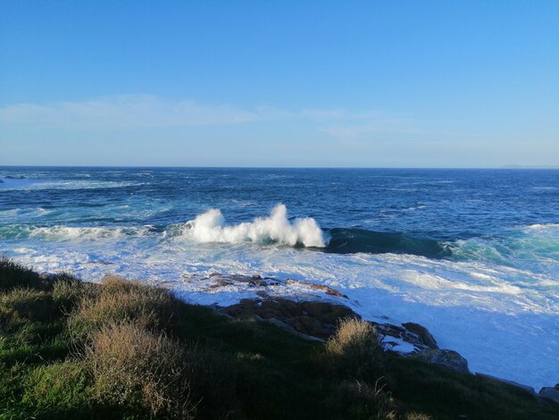 Photo scenic view of sea against clear sky