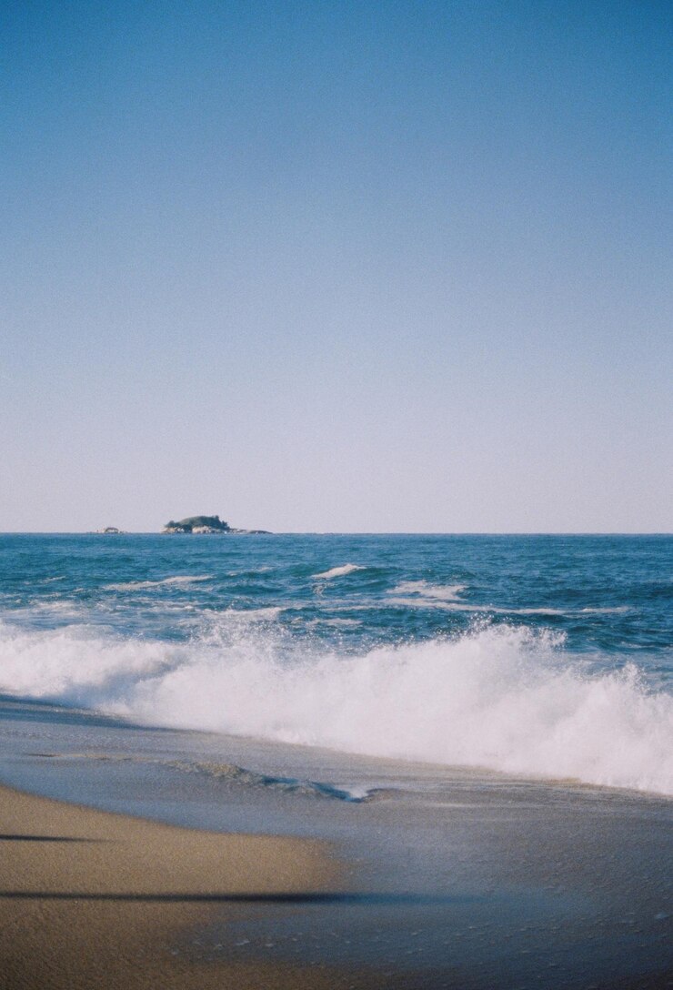 Photo 晴れた空を背景に海の景色