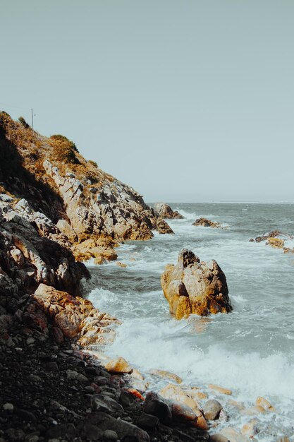 Photo scenic view of sea against clear sky