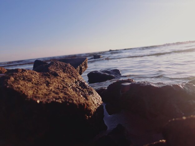 Photo scenic view of sea against clear sky