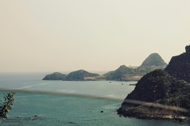 Photo scenic view of sea against clear sky