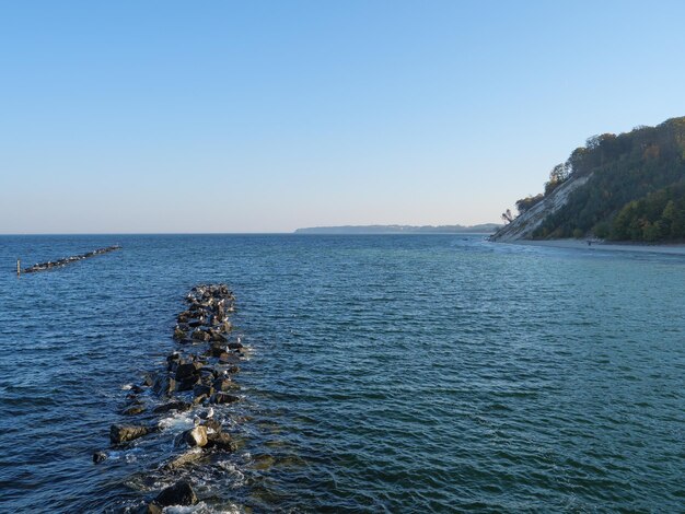 Scenic view of sea against clear sky