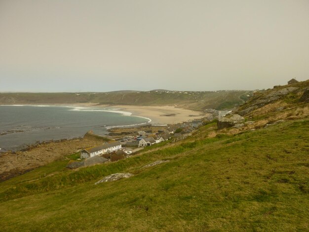 Photo scenic view of sea against clear sky