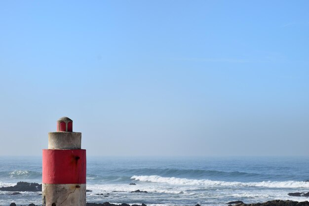 Photo scenic view of sea against clear sky