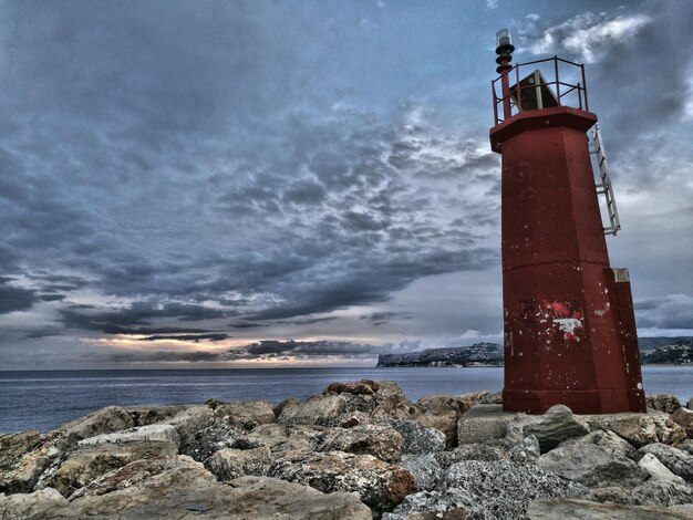 Scenic view of sea against cloudy sky