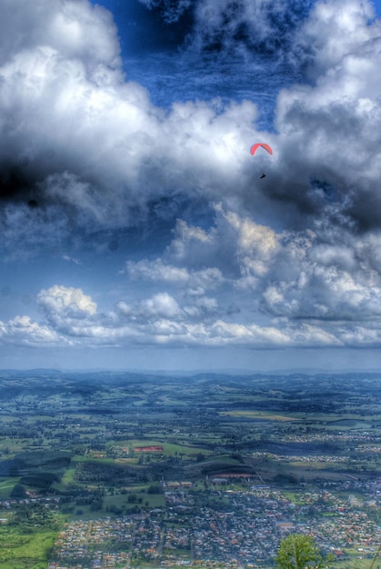 Photo scenic view of sea against cloudy sky