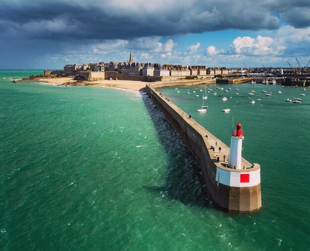 Scenic view of sea against cloudy sky