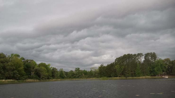 Photo scenic view of sea against cloudy sky