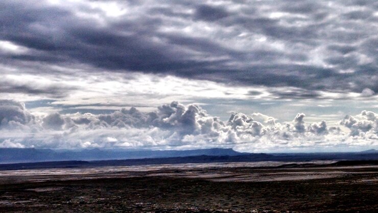 Photo scenic view of sea against cloudy sky