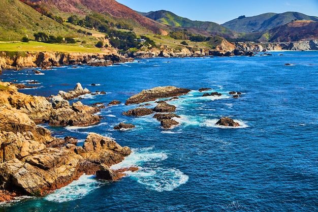 Scenic view of sea against mountain