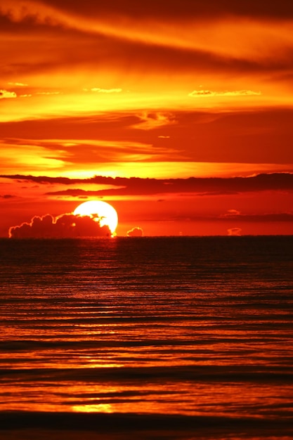 Scenic view of sea against orange sky