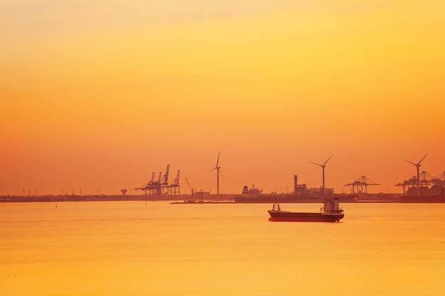 Scenic view of sea against orange sky