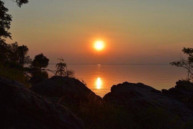 Scenic view of sea against sky during sunset