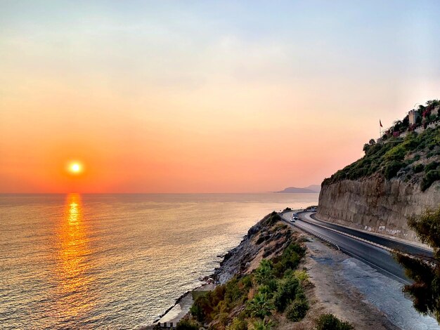 Scenic view of sea against sky during sunset