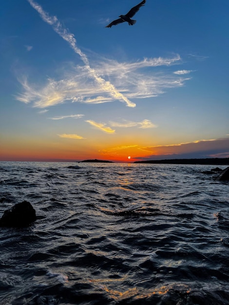 Scenic view of sea against sky during sunset