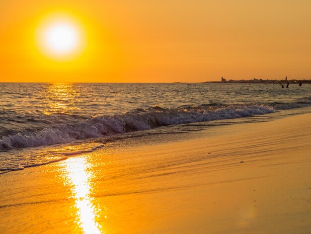 Scenic view of sea against sky during sunset