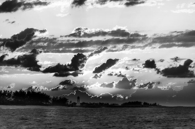 Photo scenic view of sea against sky during sunset