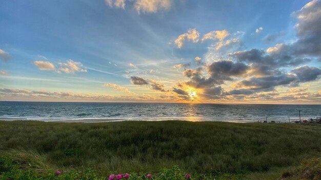 Scenic view of sea against sky during sunset