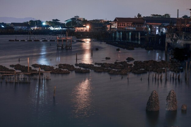 Scenic view of sea against sky at night