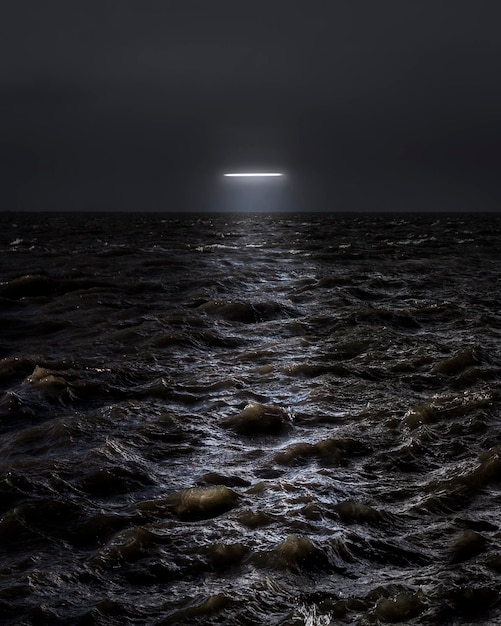 Scenic view of sea against sky at night