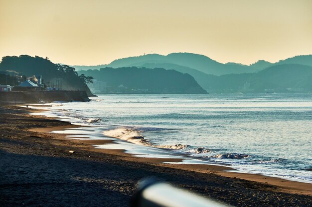 Scenic view of sea against sky during sunrise