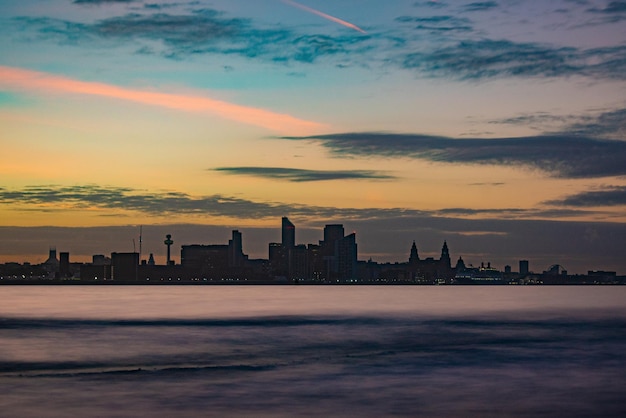 Scenic view of sea against sky during sunrise