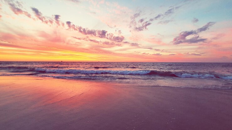Photo scenic view of sea against sky during sunset